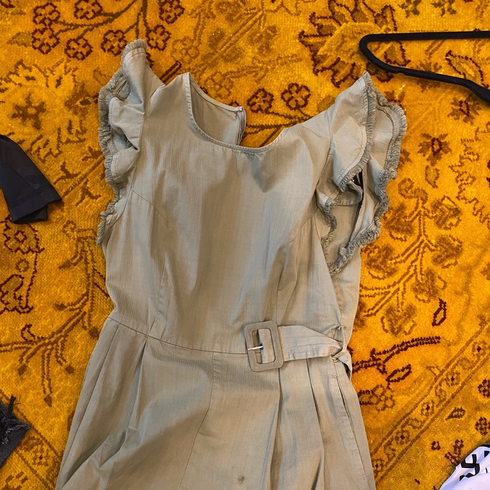 green ruffle romper size medium